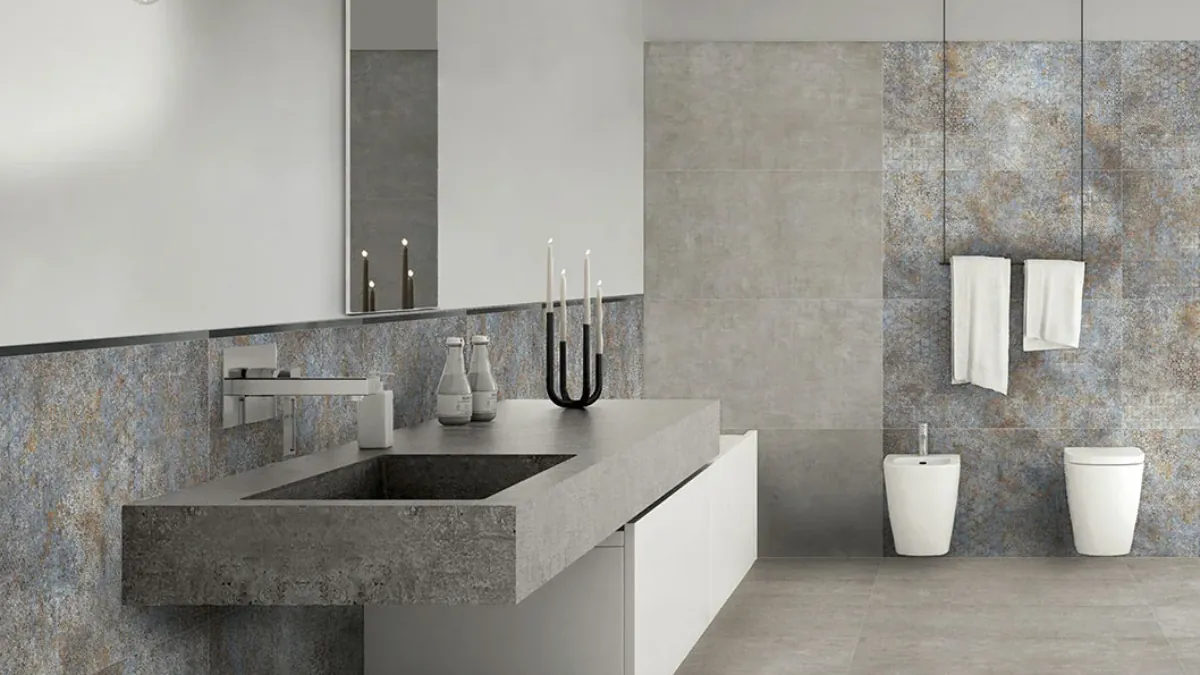 Small luxurious bathroom combining large-format wall-to-floor tiles, a wall-hung WC and floating vanity